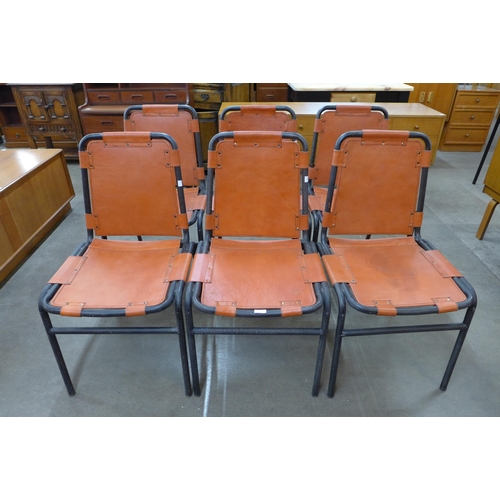 32 - A set of Les Arc style black tubular steel and leather chairs