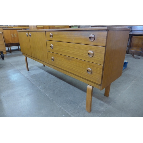 34 - A teak sideboard