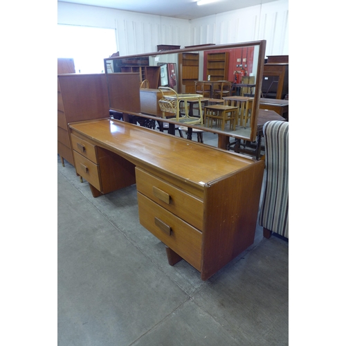 46 - A White & Newton teak dressing table