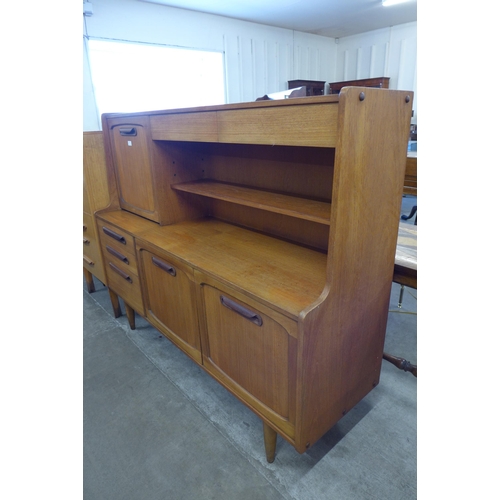 48 - A Stonehill Stateroom teak highboard