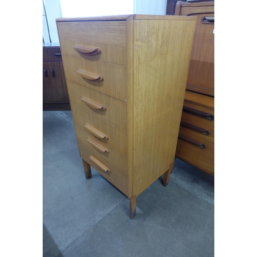 49 - A teak chest of drawers