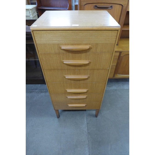 49 - A teak chest of drawers