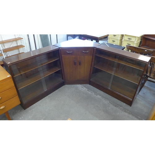 50 - A G-Plan Librenza tola wood corner desk and a pair of matching bookcases