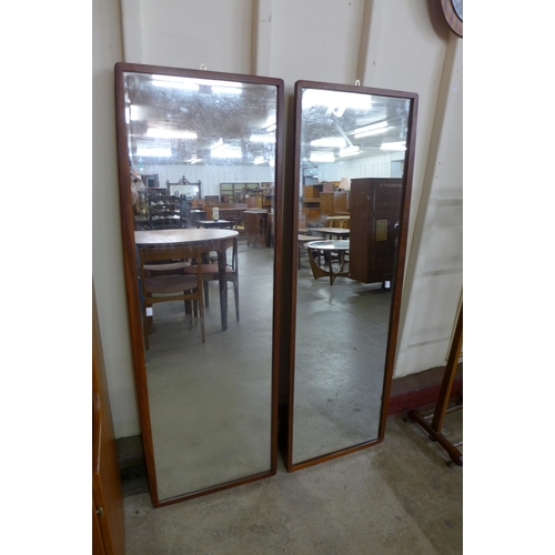 53 - A pair or G-Plan teak framed mirrors