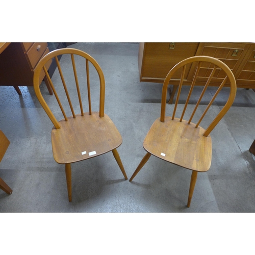 6 - A pair of Ercol Blonde elm and beech Windsor chairs