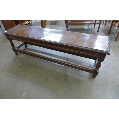 63 - A 17th Century style carved oak window seat