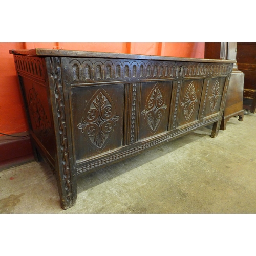 64 - A Charles II carved oak coffer