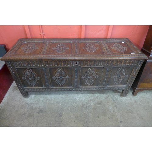 64 - A Charles II carved oak coffer