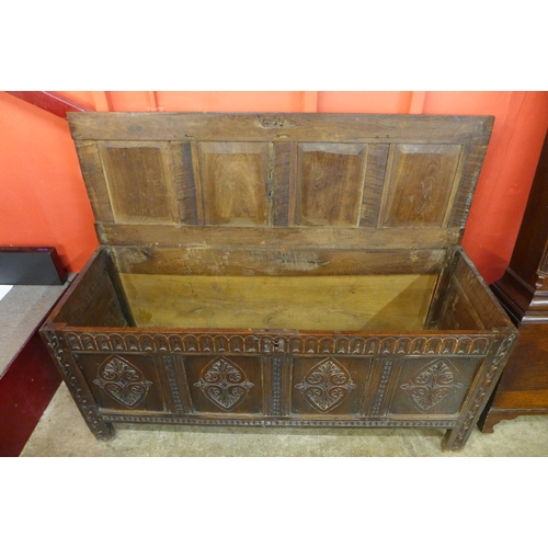 64 - A Charles II carved oak coffer