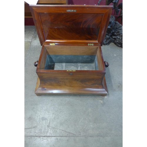 70 - An early Victorian mahogany sarcophagus shaped wine cooler