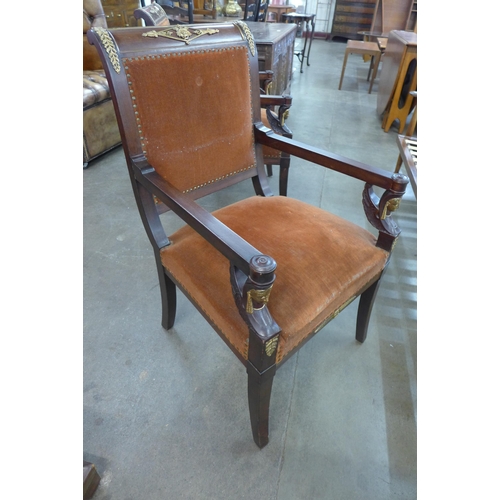 72 - A pair of 19th Century style French Egyptian Revival mahogany and gilt metal mounted fauteuil chairs