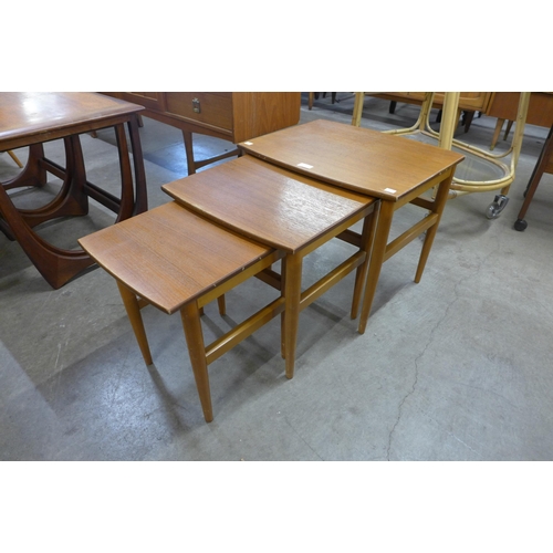 8 - A teak nest of tables