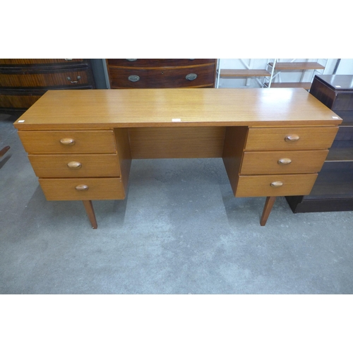 9 - An Austin Suite teak desk