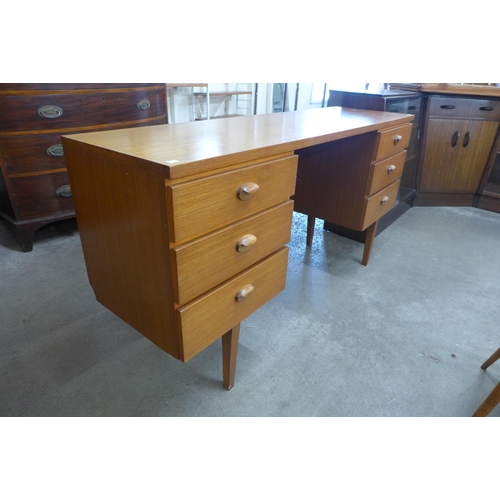 9 - An Austin Suite teak desk