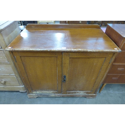 94 - A Victorian scumbled pine and beech kitchen cupboard