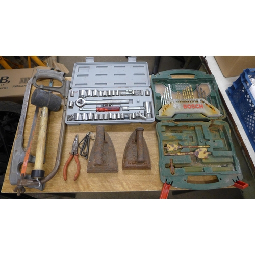 2024 - Four boxes of assorted hand tools including Bosch drill bits, socket set, hacksaws, rubber mallet, s... 