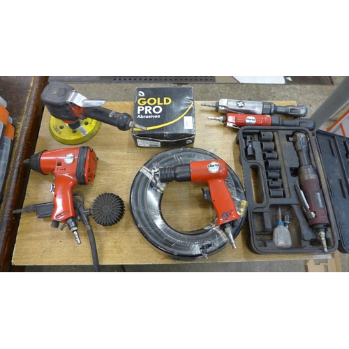 2050 - A quantity of air tools, mini sander, Gold pro abrasives and a rubber air hose,