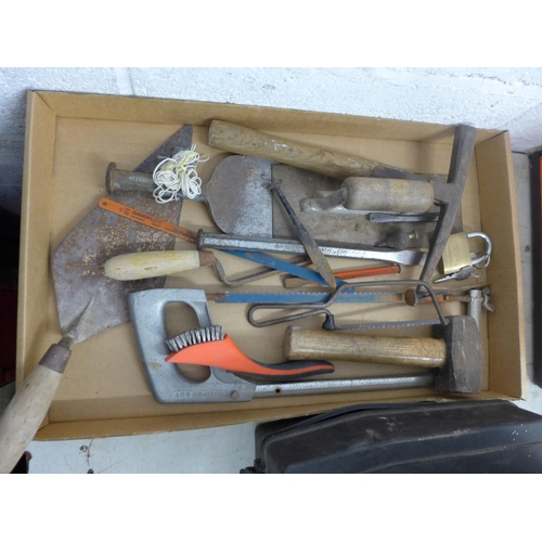 2074 - A box of assorted hand tools including hacksaw, hammer, a padlock with keys and more