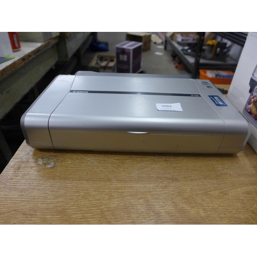 2084 - A Kodak Easy-Share photo printer and a Canon photo printer - used