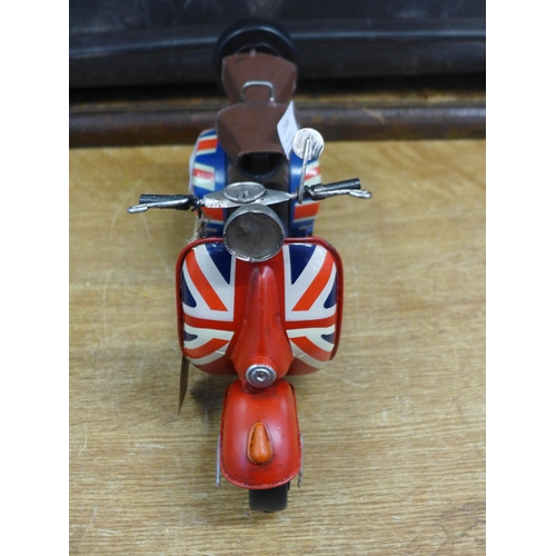 2146 - A tin plate Union Jack Vespa