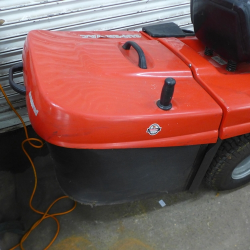 2207 - A Jonsered ICT 13 automatic ride-on mower with Briggs & Stratton engine, instruction manual, grass b... 