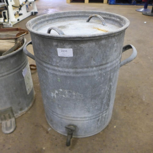 2231 - A galvanised watering can, mop bucket and water urn