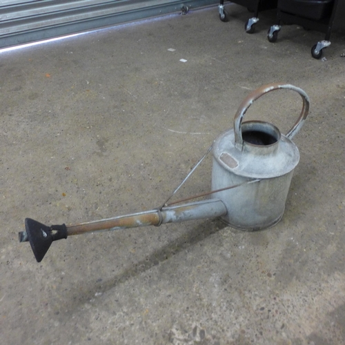 2231 - A galvanised watering can, mop bucket and water urn