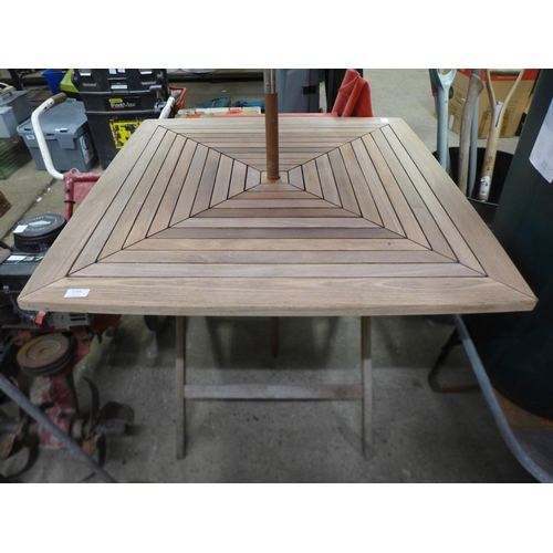 2244 - A teak garden table with two chairs and matching parasol