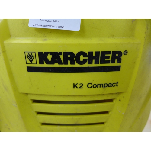 2280 - A Karcher K2 compact jet wash with 1 attachment & floor scrubber - W