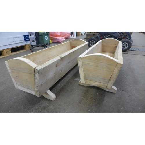 2287 - A pair of heavy duty wood planters, size 1m x 32cm