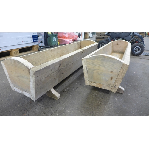 2288 - A pair of heavy duty wood planters, size 1.2 m x 32cm