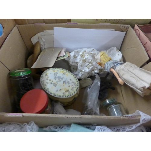 2341 - A box of mixed haberdashery, clothing, beads, vintage cotton reels, doll figure, etc.