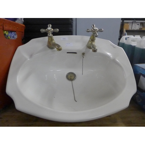 2343 - A ceramic Cottage inset sink and two chrome taps