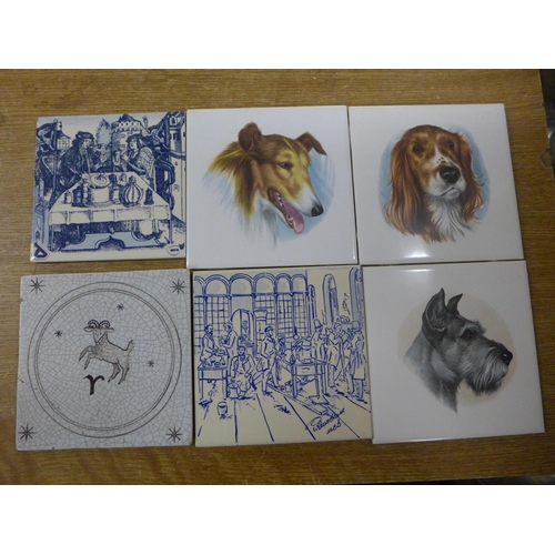 2348 - A box of tiles including dogs