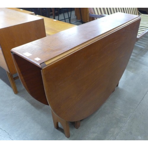 5 - A Jentique teak drop leaf table