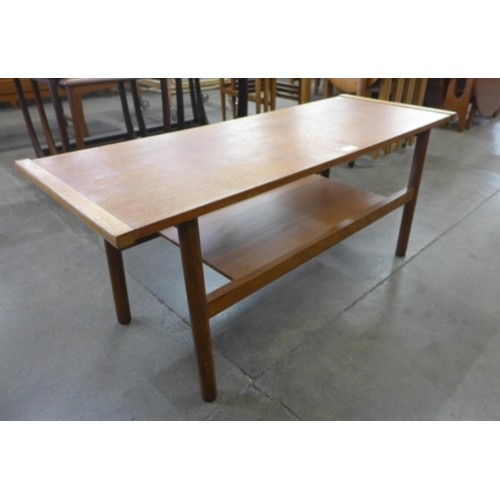 3 - A teak rectangular coffee table