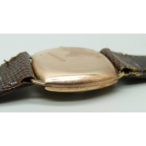 1077 - A 9ct gold Rolex wristwatch with a cushion case, the 27mm case hallmarked London 1944