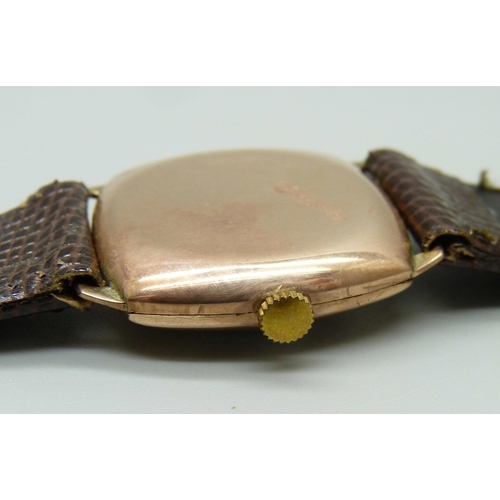 1077 - A 9ct gold Rolex wristwatch with a cushion case, the 27mm case hallmarked London 1944