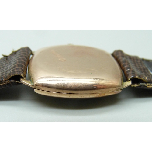 1077 - A 9ct gold Rolex wristwatch with a cushion case, the 27mm case hallmarked London 1944