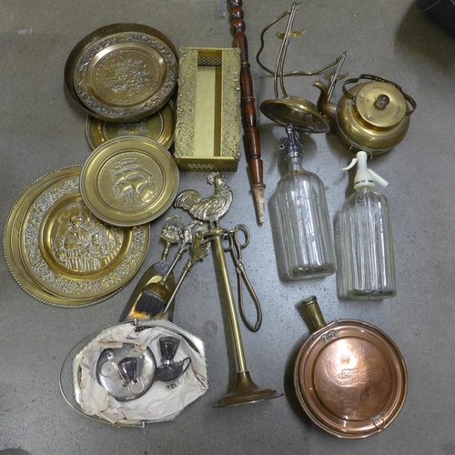 1106 - A collection of metalwares including chargers, a bed warming pan, cruet set, etc. **PLEASE NOTE THIS... 