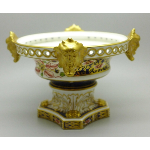 614 - A Royal Crown Derby Imari pot pourri footed bowl on lions paw feet, with classical faces, 93mm