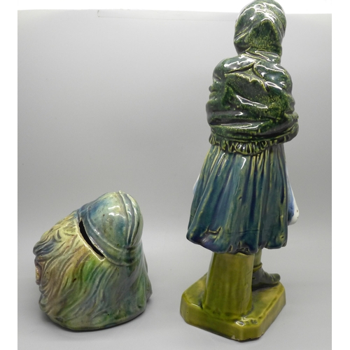 629 - A Policeman's head money box and a figure of a lady, lady a/f, both probably Bretby