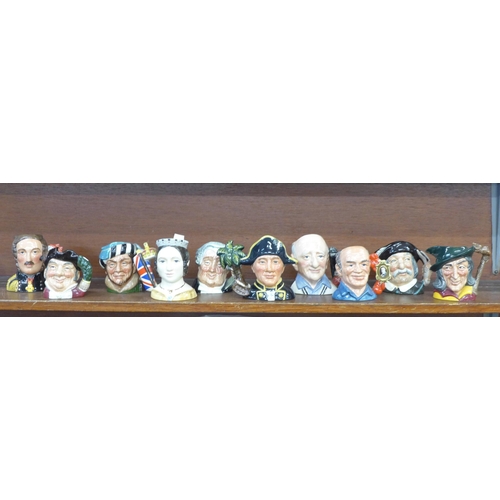 631 - Ten Royal Doulton character jugs including Henry Cooper, Prince Albert and Queen Victoria