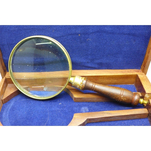 637 - Two magnifying glasses, one cased