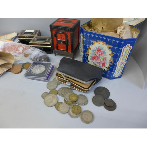 669 - A collection of coins and banknotes, mainly Victorian and later pennies, also including a dog tag, R... 