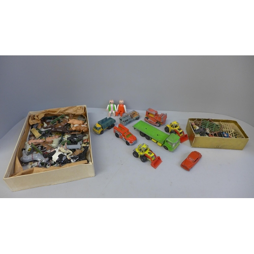 702 - A collection of Matchbox and other vehicles, playworn and a collection of lead farm animals and figu... 