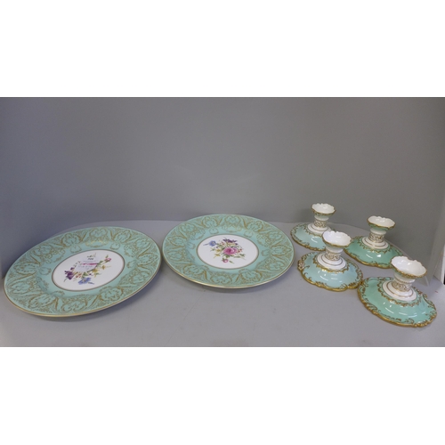 706 - Four Royal Crown Derby dwarf candlesticks and a pair of Royal Worcester dinner plates