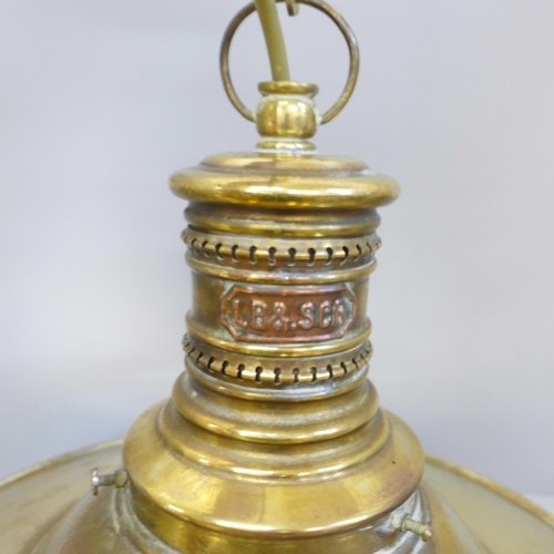 710 - An early 20th Century London Brighton and South Coast Railway station lamp, brass with original opaq... 