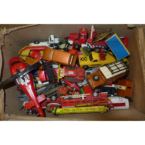 715 - A box of Dinky, Corgi and Matchbox die-cast model vehicles