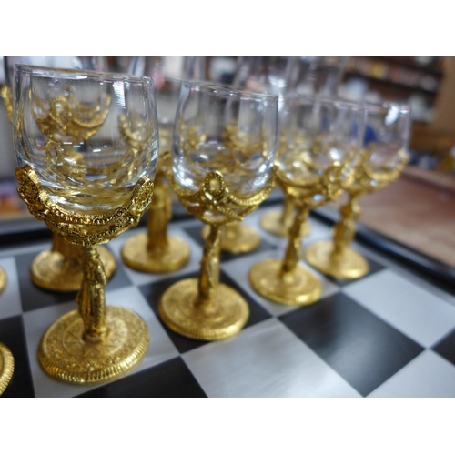 728 - A drinking chess set, two glasses a/f